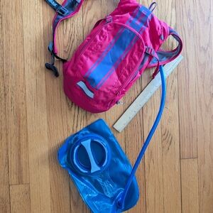 Pink/purple CamelBak hydration backpack-small
